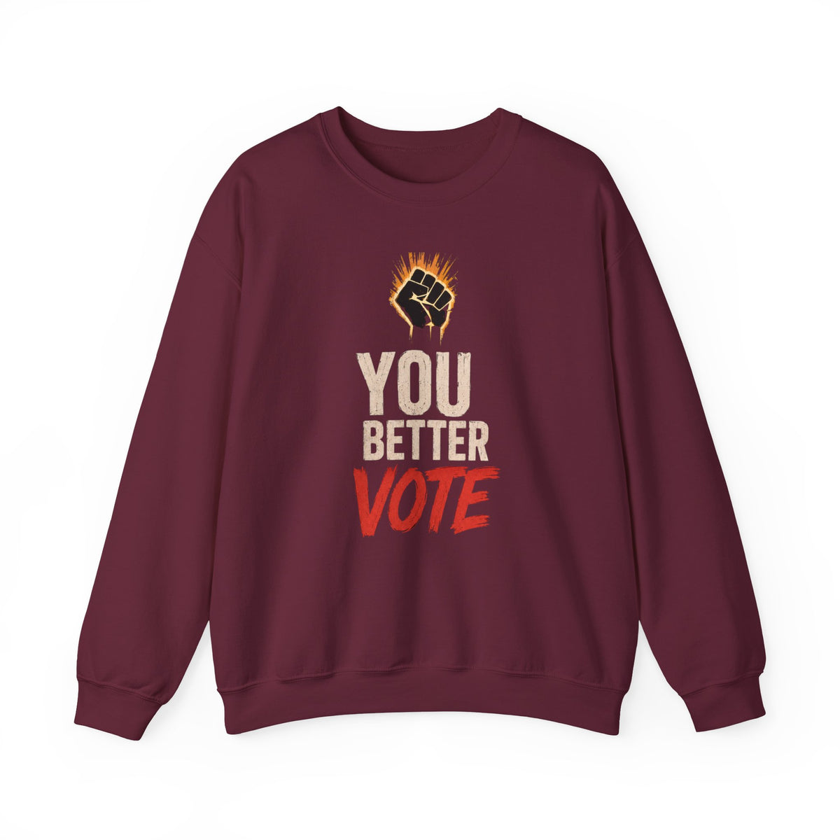 A maroon crewneck sweatshirt featuring a graphic print on the front with a raised fist in flames above the text 'YOU BETTER VOTE' in cream and red.