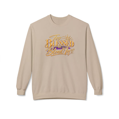 A beige crewneck sweatshirt featuring a stylized graphic on the chest that reads 'I'm Blessed to Blend In' in gold and purple lettering, displayed against a solid white background.