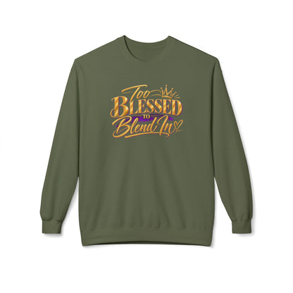 An olive green crewneck sweatshirt with a graphic on the chest that reads 'Too Blessed to Blend In' in gold and orange lettering with a purple accent, displayed on a clean white background.