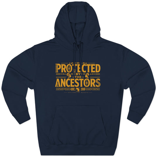 A navy blue pullover hoodie with a distressed yellow graphic on the chest that reads 'PROTECTED BY THE ANCESTORS' with decorative symbols and lines, shown on a plain white background.